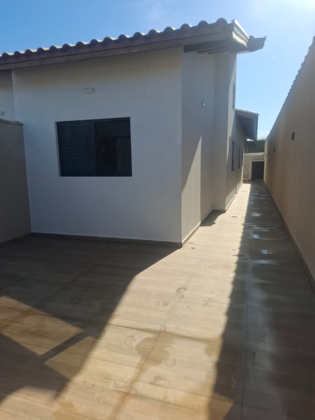 CASA GEMINADA NO JD. BOPIRANGA - LADO PRAIA - 700 METROS DO MAR - foto 3